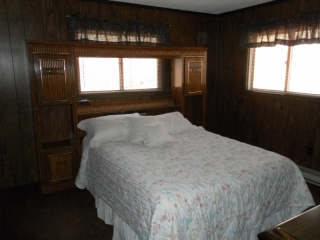 Main bedroom  with Queen bed at Snowman Cabin.